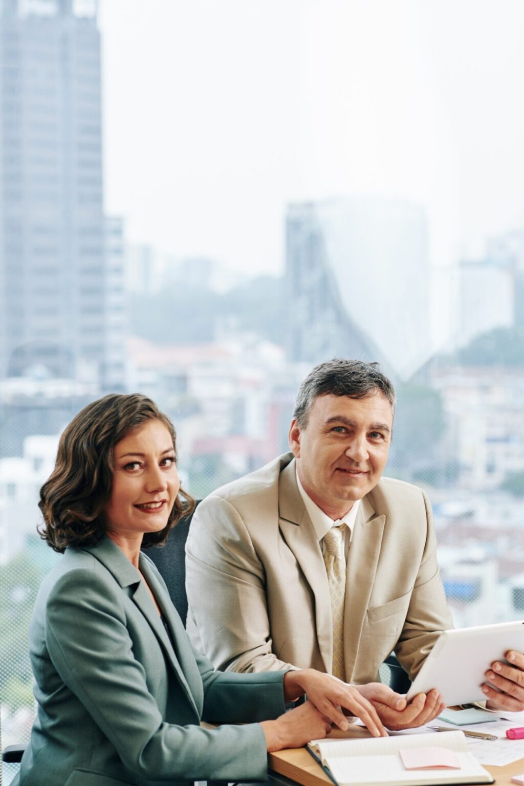 Meeting of mature business people, UK Self-Sponsorship Visa,