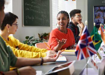 Multicultural Students Chatting in Class