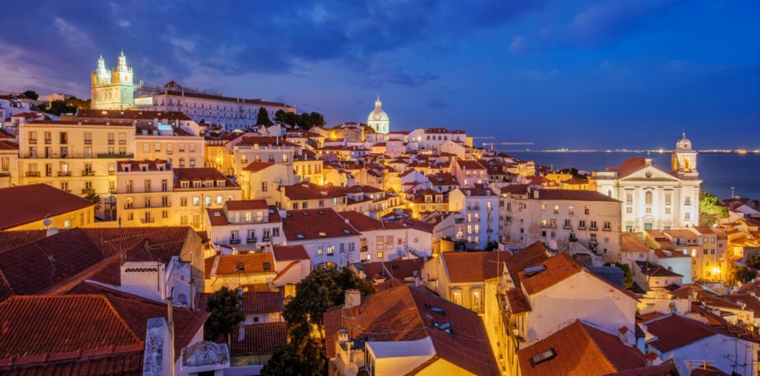 View of Lisbon from Miradouro de Santa Luzia viewpoint at evening. Lisbon, Portugal, Investment Fund,