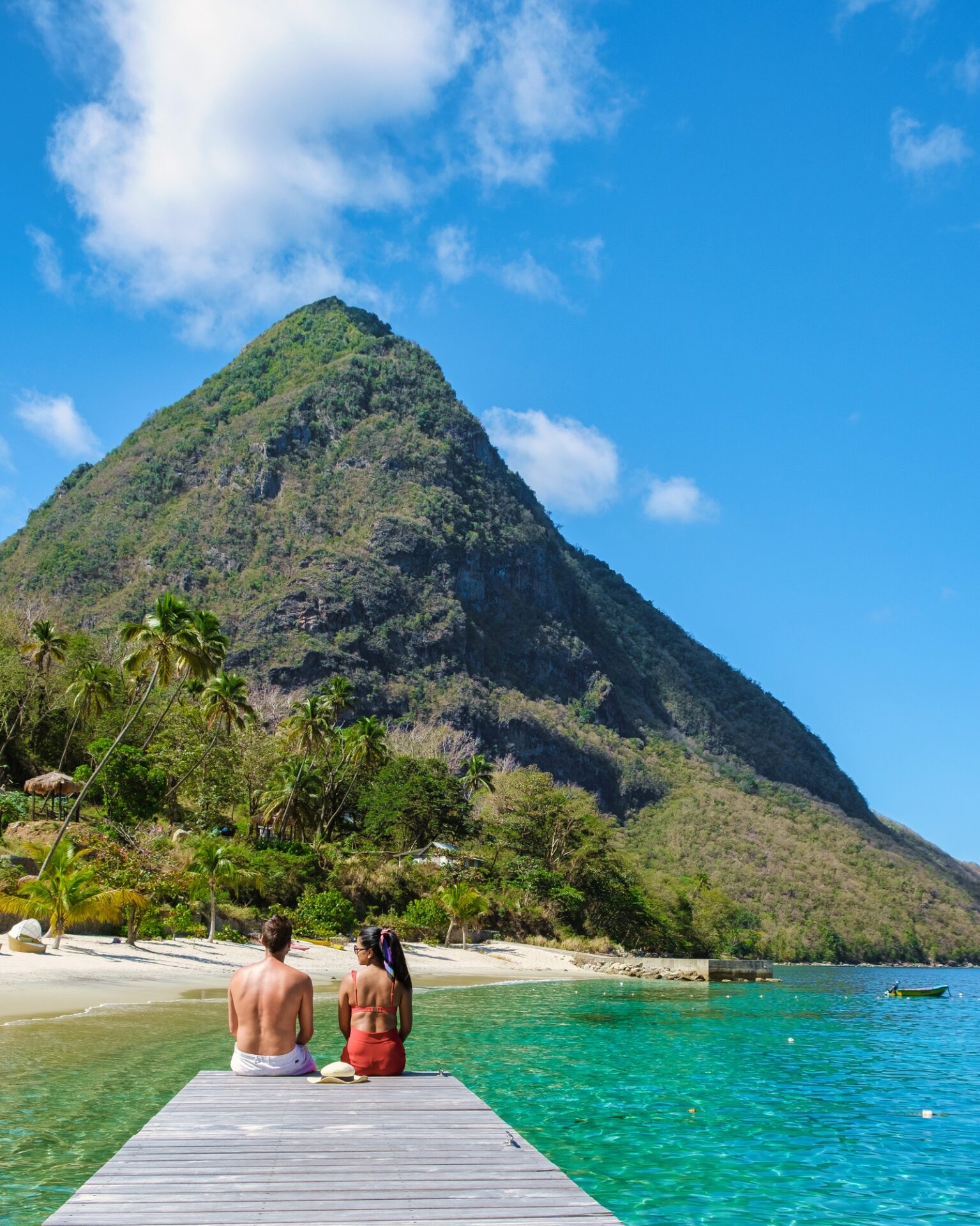 Young couple men and women vacation Saint Lucia, luxury holiday Saint Lucia Caribbean, Sugar beach